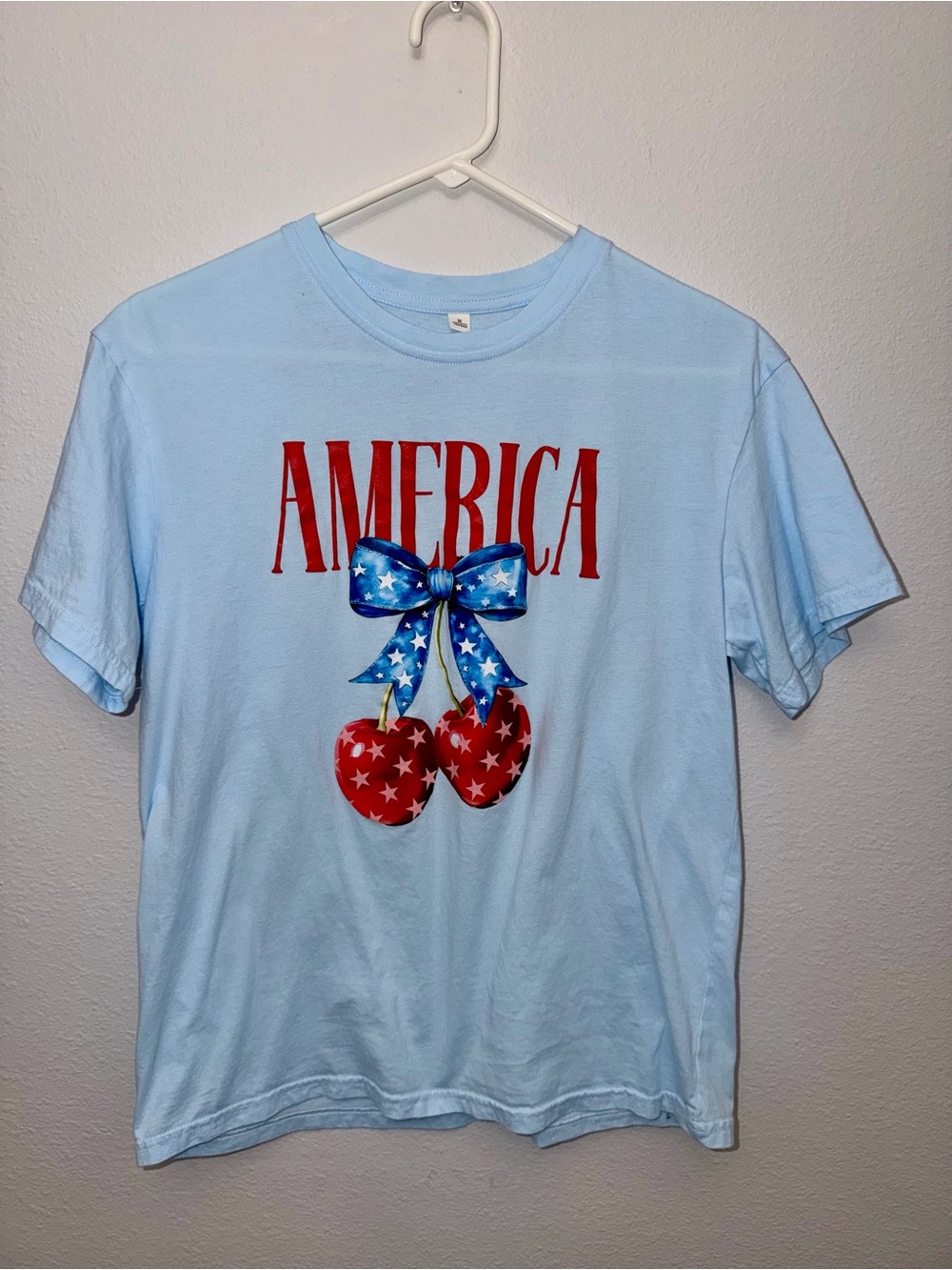 Never worn- Light Blue Short-Sleeve Tee with Patriotic Cherry Graphic